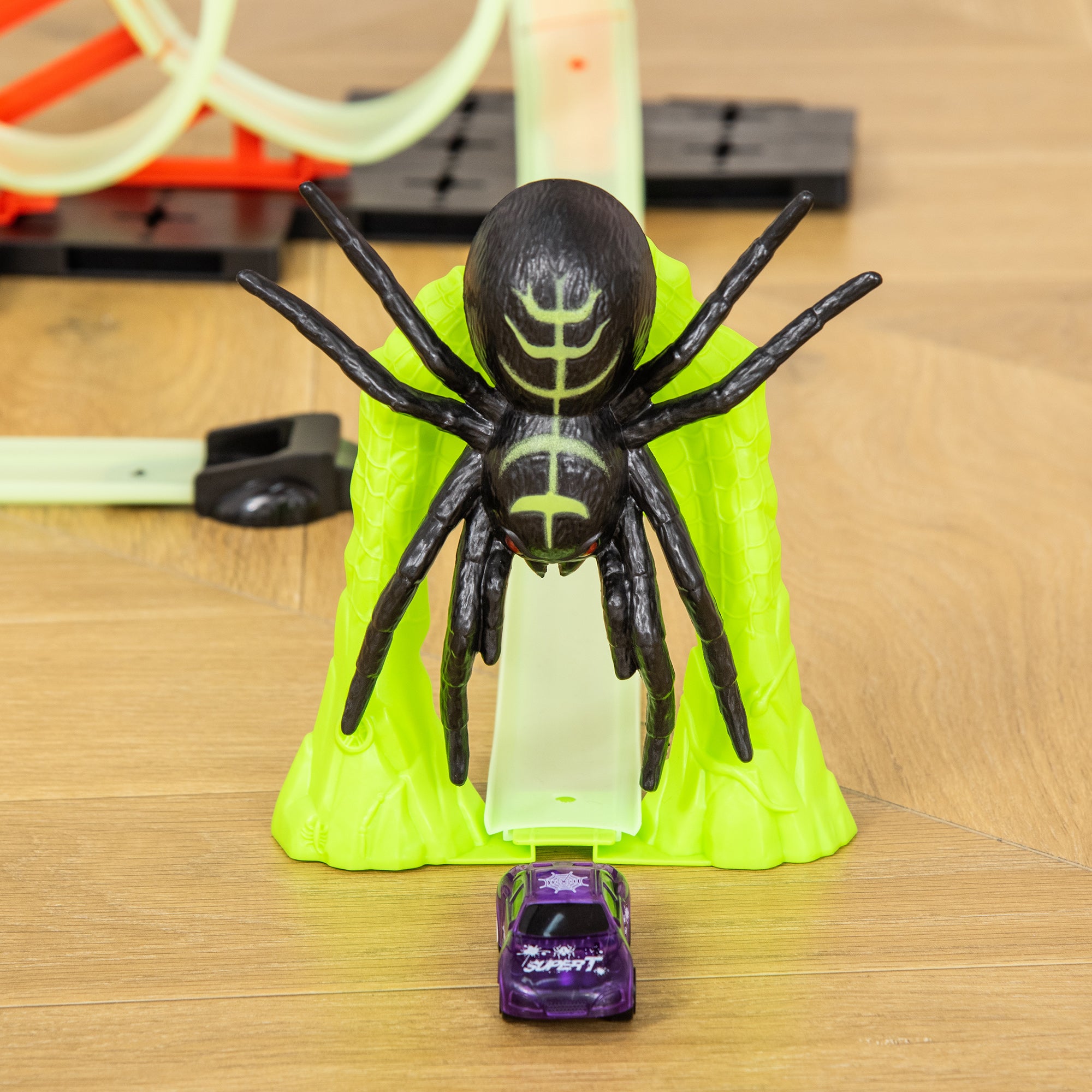 Track Builder Loop Kit Criss-Cross Glowing Race Track Toy Set Spooky Spider Fun Starter Kit